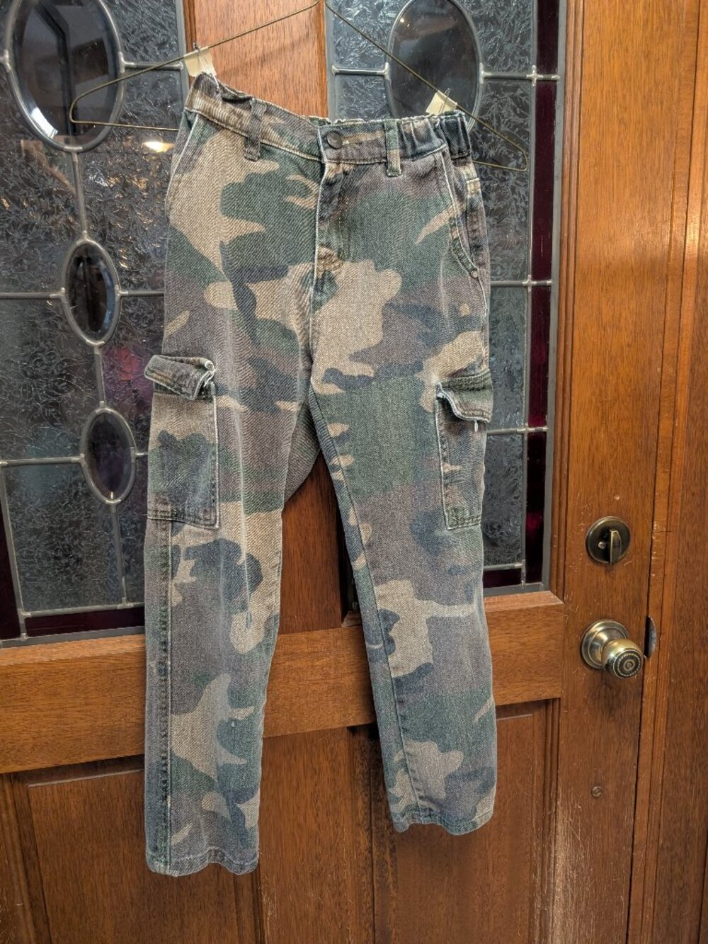 Boys green Camouflage pants, size 10